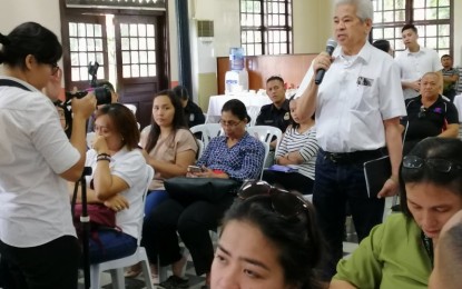 <p style="text-align: justify;"><strong>CUTTING DOWN ON RED TAPE</strong>. Francel Martinez (standing), president of the Negros Oriental Chamber of Commerce and Industry, asks the Presidential Communications Operations Office (PCOO) to conduct another roadshow on the Ease of Doing Business Act. The PCOO was on a two-day roadshow and campus caravan here Wednesday and Thursday (Nov. 27-28, 2019), for discussions on Freedom of Information, "Rehabinasyon", and Media Security, among others. <em>(Photo by Judy Flores Partlow) </em></p>