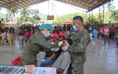 <p><strong>OUTREACH.</strong> Army dentists of the 8th Infantry Battalion join the medical and social service outreach in Barangay Dumalaguing, Imapsugong, Bukidnon, on Thursday (Nov. 28, 2019). The military says the outreach has helped convince communist rebels and sympathizers to return to mainstream society. <em>(Photo courtesy of Army's 8th IB)</em></p>