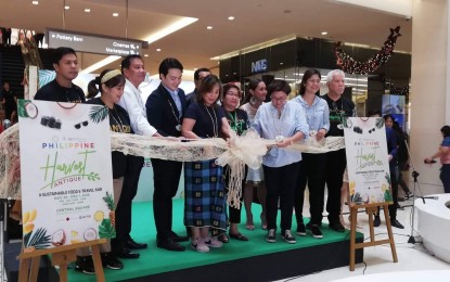<p><strong>PH HARVEST.</strong> Deputy Speaker Loren Legarda (5th from left), Antique Governor Rhodora Cadiao (3rd from right), and officials of the Department of Tourism - Antique lead the ribbon-cutting ceremony of Philippine Harvest Antique at the Central Square in Taguig City on Friday (Nov. 29, 2019). Antique is the focus of the seventh edition of the Philippine Harvest, a trade fair that brings together the best of what each region around the country has to offer. <em>(PNA photo by Joyce Rocamora)</em></p>
