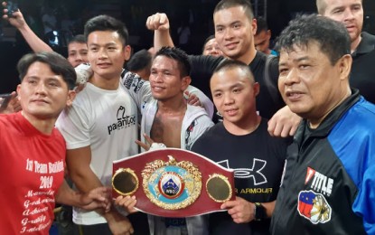 <p><strong>NEW WORLD CHAMP</strong>. John Riel Casimero celebrates a previous victory in this photo. Casimero on Sunday (Dec. 1, 2019, PH time) knocked out Zolani Tete of South Africa to win the WBO bantamweight title in Birmingham, England. <em>(PNA photo by Ivan Stewart Saldajeno)</em></p>