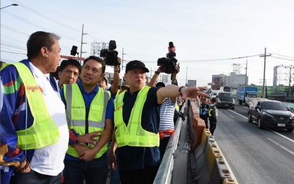 <p>(From left) Transportation Sec. Arthur Tugade, Public Works and Highways Sec. Mark Villar and San Miguel Corporation President and Chief Operating Officer, Ramon S. Ang<em> (SMC photo)</em></p>
