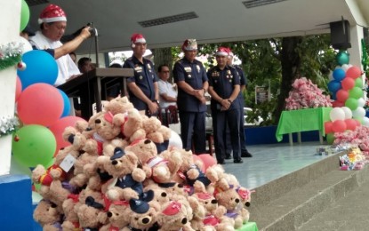 <p><strong>GIFT-GIVING.</strong> Some 150 children receive an early Christmas gifts from the Davao City Police Office during its annual “Pamaskong Handog Alay sa Kabataan 2019” at its headquarters in Camp Leonor Domingo, Davao City on Monday (Dec. 2, 2019). The program was initiated by former DCPO chief, Col. Alexander Tagum in coordination with other stakeholders. <em>(PNA photo by Rhoda Grace Saron)</em></p>