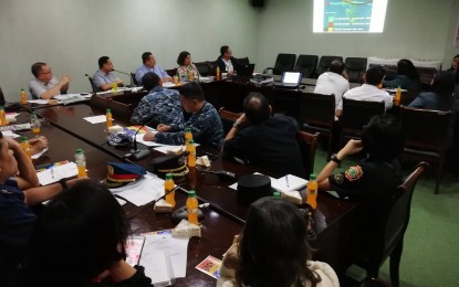 <p><strong>BRACING FOR 'TISOY'.</strong> The Iloilo Provincial Disaster Risk Reduction and Management Council (PDRRMC) convene at the Iloilo Provincial Capitol to prepare for the onslaught of Typhoon Tisoy on Monday (Dec. 2, 2019). Provincial Disaster Risk Reduction and Management Office head Dr. Jerry Bionat advised Ilonggos, especially those living in the island villages, to store food and water good for at least three days.<em> (PNA photo by Gail Momblan)</em></p>