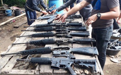 <p><strong>SEIZED.</strong> Government troops on Sunday (Dec. 1, 2019) seize an arms cache belonging to the New People's Army  in Barangay San Isidro, Kapatagan, Lanao del Norte. The recovery came hours after the arrest of two NPA ranking leaders in Barangay Dableston, Sultan Naga Dimaporo, Lanao del Norte. <em>(Photo courtesy of the Army's 1st Infantry Division)</em></p>