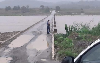 <p><strong>SWELLING RIVER.</strong> The Manglad River in Maddela, Quirino swells. This as Typhoon Tisoy dumped rains in many parts of Luzon from Monday night to Tuesday (Dec. 3, 2019).<em> (Photo courtesy of PNP-Maddela, Quirino)</em></p>