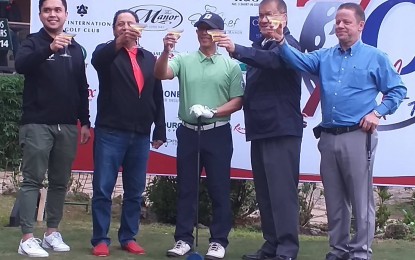 <p><strong>FORE</strong>. The executive committee of the 70th Fil-Am Invitational Golf Tournament poses after the ceremonial tee Tuesday at the Baguio Country Club (CJH). (From left) Engkanto Beer marketing manager Miguel Francisco, Camp John Hay vice president Shean Bedi, Baguio Mayor Benjamin Magalong, Baguio Country Club (BCC) general manager and Fil-Am co-chair Anthony de Leon and Camp John Hay golf manager and Fil-Am co-chair Tim Allen. <em>(PNA photo by Pigeon Lobien)</em></p>