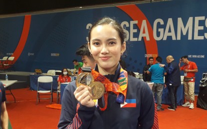 <p><strong>DOUBLE-GOLD WINNER</strong>. Filipina wushu star Agatha Chrystenzen Wong wins her second gold medal in the 30th Southeast Asian Games at the World Trade Center in Pasay City on Tuesday (Dec. 3, 2019). The Philippines bagged the overall title in wushu competition with seven golds, two silvers and one bronze. <em>(PNA photo by Jelly Musico)</em></p>