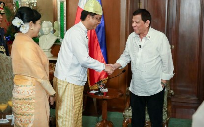 <p><strong>COURTESY CALL</strong>. President Rodrigo R. Duterte shares a light moment with U Lwin Oo, the Resident Ambassador-Designate of the Republic of the Union of Myanmar to the Philippines, who presented his credentials to the President at Malacañan Palace on Thursday (Dec. 4, 2019). Duterte also received the credentials of Ambassadors to the Philippines Grete Sillasen (Denmark), Shobini Gunasekera (Sri Lanka), Antonis Alexandridis (Greece), Bartinah Ntombizodwa Radebe-Netshitenzhe (South Africa), and Huang Xilin (China).<em><strong> (Presidential photo by Rey Baniquet)</strong></em></p>