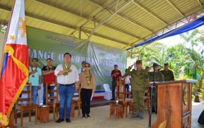 <p><strong>CHANGE OF COMMAND.</strong> Local officials, led by North Cotabato Governor Nancy Catamco (center) and Sultan Kudarat Governor Suharto Mangudadatu (in white long sleeves), join the turnover of command of the Army’s 602nd Infantry Brigade (Bde) in Carmen, North Cotabato on Wednesday (Dec. 4, 2019). Brigadier General Roberto Capulong, a former senior military assistant to Defense Secretary Delfin Lorenzana, is the new brigade commander replacing Brig. Gen. Alfredo Rosario Jr., who was reassigned as deputy commander of the Eastern Mindanao Command based in Davao City. <em>(Photo courtesy of 6th Infantry Division)</em></p>