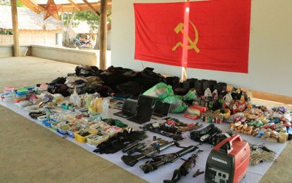 <p><strong>RECOVERED FIREARMS</strong>. The Army's 23rd Infantry Brigade display the firearms and other materials they recovered after a 15-minute firefight with the New People’s Army rebels in Sitio San Jose, Barangay Durian in Las Nieves, Agusan del Norte on Dec. 4, 2019. President Rodrigo Duterte on Monday (July 12, 2021) expressed hope that government forces would be able to dismantle all the communist terrorist groups (CTGs) by the end of his term next year. <em>(Photo courtesy of 23IB)</em></p>