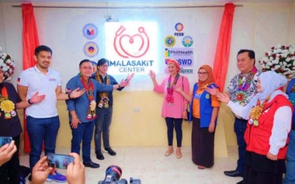 <p><strong>ONE-STOP HEALTH FACILITY.</strong> Senator Christopher Lawrence “Bong” Go (2nd from left) leads the opening of the 53rd Malasakit Center in the country at the Maguindanao provincial hospital in Datu Hoffer municipality,  Maguindanao on Friday (Dec. 6, 2019), along with Maguindanao Governor Bai Mariam Sangki-Mangudadatu (4th from right) and Sultan Kudarat Governor Suharto Mangudadatu (2nd from right). The senator assured Maguindanao health and local officials that the administration of President Rodrigo Duterte will ensure that health services reach the indigents. <em>(Photo courtesy of Senator Bong Go's office)</em></p>