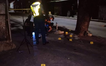 <p><strong>KILLED IN BUY-BUST.</strong> Police officers inspect the area where a buy-bust operation resulted in the death of drug suspect, retired Cpl. Tirso Lactaotao in Barangay Novaliches Proper in Quezon City on Monday (Dec. 9, 2019). The operation stemmed from intelligence reports about rampant drug-dealing in Rizal and nearby provinces involving Lactaotao. <em>(Photo courtesy of IMEG)</em></p>