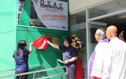<p><strong>ONE-STOP HUB.</strong> Department of Agriculture 13 regional executive director Abel James Monteagudo (2nd from left) and Marketing Assistance Division chief, Lynn Pareñas (left), lead the formal opening of the One-Stop Agribusiness Center on Tuesday (December 10) at the DA compound in Butuan City. The center will accommodate regional products and also serve as an information center for agribusiness matters in the region. <em>(Photo courtesy of DA-13 Information Office)</em></p>