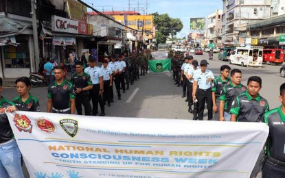 <p><strong>MARCH FOR PEACE.</strong> More than a hundred members of youth organizations in Caraga Region, together with the Army and the police, join the 'March for Peace' in connection with the observance of National Human Rights Consciousness Week in Butuan City on Tuesday (Dec. 10, 2019). The activity is part of the commitment of the Armed Forces of the Philippines and the Philippine National Police to uphold and protect the rights of every citizen especially the youth. <em>(Photo courtesy of the Army's 402nd Brigade)</em></p>