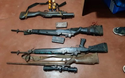 <p><strong>CONFISCATED.</strong> The illegal firearms seized from the house of suspect Roderick Platon of Barangay Looy, South Upi, Maguindanao on Monday (Dec. 9, 2019). Four firearms and various munitions were found at the house of the suspect, who managed to escape before joint police and military raiding team arrived. <em>(Photo courtesy of CIDG-BARMM)</em></p>