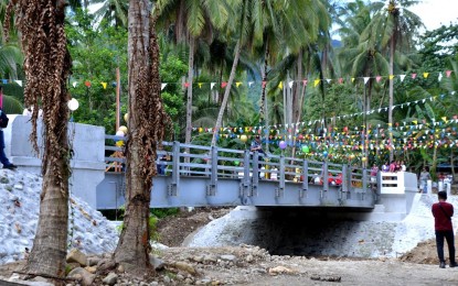 <p><strong>NEW BRIDGE.</strong> The Department of Agrarian Reform (DAR) 8 (Eastern Visayas) turned over to Magsaysay village in Javier, Leyte on Wednesday (Dec. 11, 2019) a bridge that would benefit about 10,000 villagers. The PHP9.7 million project was funded by the French government through the Compagnie Francaise d’Assurance pour le Commerce Extérieur (COFACE) coursed through DAR. <em>(Photo courtesy of DAR-8)</em></p>