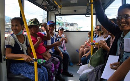 <p>In this file photo, passengers in Cagayan de Oro City enjoy a ride inside a government-approved public utility vehicle. This is set to replace the old models as part of the government's transport modernization program.<em> (PNA file photo)</em></p>