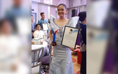 <p><strong>YOUTH LEADERSHIP AWARDEE.</strong> Kizziah Ella Claveria of the St. John’s Cathedral School in Dagupan City during the awarding of the ‘Mga Bagong Rizal: Pag-asa ng Bayan’ Award in Quezon City on November 29, 2019. She is one of the 17 winners of the prestigious award, representing the Ilocos region. <em>(Photo courtesy of Vox Scholae's Facebook page)</em></p>