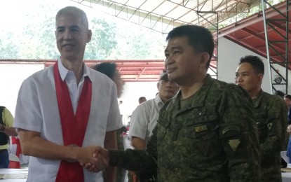 <p><strong>NEW COMMANDER</strong>. Army Col. Inocencio Pasaporte (right), who assumed as commander of the 303rd Infantry Brigade based in Murcia, Negros Occidental on Thursday (Dec. 12, 2019) meets Governor Eugenio Jose Lacson after the change of command held at the brigade headquarters. Pasaporte succeeded Brig. Gen. Benedict Arevalo. <em>(PNA photo by Nanette L. Guadalquiver)</em></p>