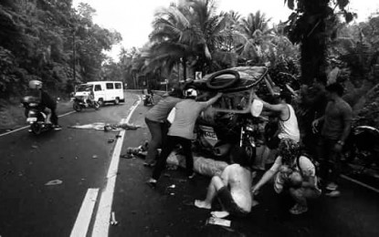 <p><strong>BOMBING VICTIMS.</strong> Bypassers rescue tricycle passengers seriously wounded by an explosion perpetrated by the New People's Army in Libuton village in Borongan City, Eastern Samar Friday afternoon (Dec. 13, 2019). A junior police officer and an old woman were killed while four policemen and 12 civilians, including three minors, were injured in the incident. <em>(Photo courtesy of  Alexis Genelex Deloria)</em></p>
