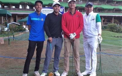 <p><strong>EARLY BIRDS</strong>. The first flight of players for the Fil Championship (from left) Manila Southwoods’ Lanz Uy, Rocky Co of Forest Hills, Gido Mandanas of Royal Northwoods and Theody Pascual of Team Time Cargo Logistics. Southwoods virtually won on Tuesday (Dec. 17) championship titles in the Fil and Am divisions of the 70th Fil-Am Invitational Golf Tournament at the Baguio Country Club. <em>(PNA photo by Pigeon Lobien)</em></p>