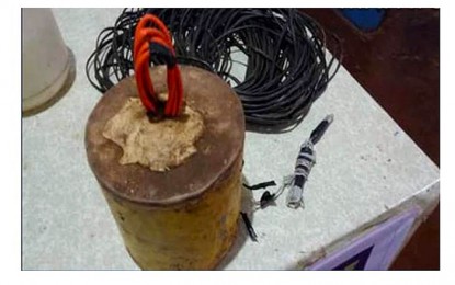 <p><strong>BOMB-MAKING MATERIALS.</strong> The improvised explosive device confiscated by a team of police and military personnel after serving a search warrant on the residence of Ariel Sarida Azucena in Barangay Jaliobong, Kicharao, Agusan del Norte on Monday evening (December 16, 2019). Also confiscated were several bomb-making materials, including sacks of ammonium sulfate, a 52-meter electrical wire, and electric blasting caps. <em>(Photo courtesy of PRO-13 Information Office)</em></p>