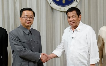 <p>President Rodrigo Roa Duterte and Chinese Ambassador to the Philippines Huang Xilian. <em>(PNA File Photo)</em></p>
