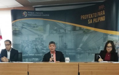 <p><strong>PPP INVESTMENTS. </strong>Public-Private Partnership Center (PPPC) [from left to right] Deputy Executive Director Eleazar Ricote, Executive Director Ferdinand Pecson, and Deputy Executive Director, Atty. Mia Mary Sebastian discuss the PPPC's accomplishments for 2019 in a press conference at the PPPC office in Quezon City on Wednesday (Dec. 18, 2019). The PPPC said a total of PHP2.1 trillion worth of PPP projects have been invested in the Philippines since the establishment of the build-operate-transfer law in 1994. (<em>Photo by Raymond Carl Dela Cruz)</em></p>