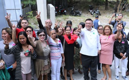 <p><strong>JUSTICE SERVED</strong>. Relatives of the Maguindanao massacre victims accompanied by lawyer Harry Roque (3rd from right) flash the victory sign after the promulgation of the decision on the case in Camp Bagong Diwa, Taguig City on Thursday (Dec. 19, 2019). A decade after the incident, the Quezon City Regional Trial Court found Datu Andal Unsay Ampatuan, Jr., Zaldy Ampatuan, Anwar Ampatuan, Sr., and several others guilty of 57 counts of murder and were sentenced to reclusion perpetua (up to 40 years imprisonment).<em> (PNA photo by Joey Razon)</em></p>