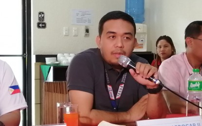 <p><strong>REVOKED.</strong> Rafael Abrogar II (in photo), director of the Technical Education and Skills Development Authority (TESDA) in Region 12, announces on Thursday (Dec. 19, 2019) the revocation of the registration of a technical-vocational school in General Santos City and its “perpetual disqualification” from the government’s scholarship programs due to alleged cases of “ghost trainings and trainees.” The order was issued by TESDA Director General Isidro Lapeña based on a recommendation from the agency’s national inspectorate for scholarship programs. <em>(PNA photo by Allen V. Estabillo)</em></p>