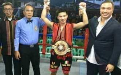 <p><strong>IFUGAO PRIDE</strong>. Carl Jammes Martin after knocking out George Lumoly in 2017 where he won the WBA Asia bantamweight crown. The 20-year-old Ifugao will face Philip Luis Cuerdo for the Philippine Boxing Federation bantamweight crown Saturday at the Manila Arena. <em>(Photo courtesy of Philboxing)</em></p>