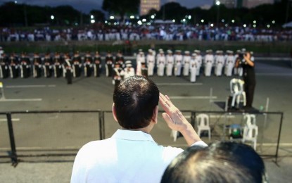 <p><strong>SILENT DRILL.</strong> President Rodrigo Roa Duterte salutes the participants of the National Reserve Officers' Training Corps (ROTC) Summit and the 1st Presidential Silent Drill Competition at the Quirino Grandstand in Manila Friday (Dec. 20, 2019). The Armed Forces of the Philippines said it will comply with Duterte's directive to have regular Silent Drill performances. <em>(Presidential photo of Rey Baniquet)</em></p>
