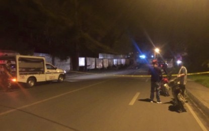 <p><strong>SEALED OFF.</strong> Policemen seal off the junction of Sinsuat and Quezon Avenues in Cotabato City on Sunday night (Dec. 22) following a blast that injured 14 people. Tight security measures are currently being implemented in the city following Sunday’s blasts.<em> (Photo courtesy of Jome K. Dimapalao–Brigada Cotabato News FM)</em></p>