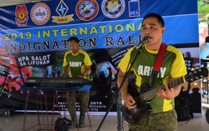 <p><strong>CONCERT FOR PEACE.</strong> A band from the Phil. Army’s 4th Infantry Division renders a song during the peace concert organized by the Army and Philippine National Police at the Kiosko sa Kagawasan (freedom kiosk) in Divisoria, Cagayan de Oro City on Thursday (Dec. 26, 2019). The concert was aimed at countering whatever activity the Communist Party of the Philippines (CPP) has planned on its 51st anniversary on Thursday. <em>(Photo by Jigger J. Jerusalem)</em></p>