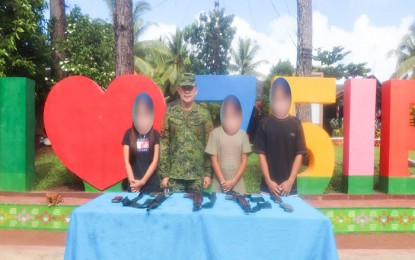 <p><strong>NEW LIFE.</strong> A couple and another member of the New People’s Army (NPA) were welcomed by the 75th Infantry Battalion of the Philippine Army during their surrender on Thursday (Dec. 26, 2019) in Bislig City, Surigao del Sur. The NPA couple, who worked by the rebel movement for 15 years expressed hope the government will help them rebuild their family and return to their community. <em>(Photo courtesy of CMO, 75th IB, Philippine Army)</em></p>