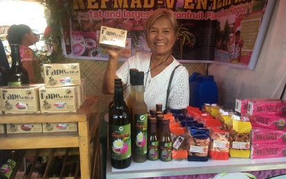 <p><strong>MULTI-AWARDED ENTREPRENEUR.</strong> Edita Dacuycuy, a multi-awarded farmer-scientist-entrepreneur from Pasuquin, Ilocos Norte proudly shows her latest innovative product -- the dragon fruit coffee brew for a nutritious and healthy coffee drink. She is one of the most promising entrepreneurs in the province who envisions to elevate her products in the international market very soon. <em>(Photo by Leilanie G. Adriano)</em></p>