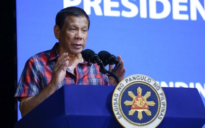 <p>President Rodrigo Duterte delivers a speech during the 60th founding anniversary of Cor Jesu College (CJC) at the CJC Almendras Gym in Digos City, Davao Del Sur on December 30, 2019. <em>(Presidential Photo) </em></p>