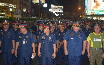 <p><strong>THANKSGIVING PROCESSION.</strong> NCRPO acting chief Brig. Gen. Debold Sinas (second from right) leads police officers who joined the thanksgiving procession of the Black Nazarene in Quiapo, Manila on Monday (Dec. 30, 2019). The NCRPO implemented a new security scheme during the procession which ended early Tuesday. <em>(Photo courtesy of NCRPO PIO)</em></p>
