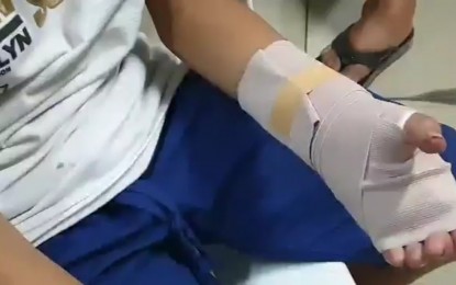 <p><strong>INJURED</strong>. A 13-year-old boy injured by firecracker was treated at Corazon Locsin Montelibano Memorial Hospital in Bacolod City on Tuesday night (Dec. 31, 2019). At least 26 persons, including 11 minors, have been injured during the New Year celebrations across Negros Occidental as of Wednesday morning. <em>(Photo courtesy of Adrian Bobe)</em></p>