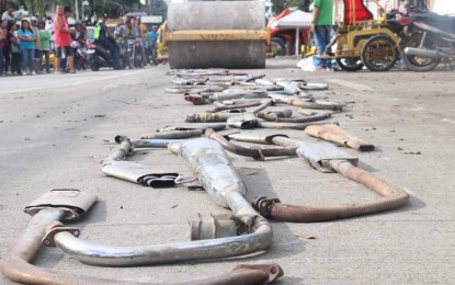 <p><strong>MUFFLERS DESTROYED.</strong> Open-pipe motorcycle mufflers are destroyed in Iloilo's Passi City on Thursday (Jan. 2, 2020). Passi City Mayor Stephen Palmares said on Saturday the mufflers caused disturbance among people living along Passi City roads. <em>(Photo courtesy of Passi City LGU)</em></p>