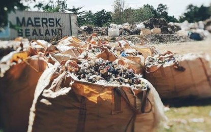 <p><strong>FOREIGN GARBAGE</strong>. A file photo of industrial garbage packed in sacks, inside the Phividec Industrial Authority. The garbage was docked inside the premises of its consignee, Verde Soko Inc., inside the industrial estate in Tagoloan, Misamis Oriental last year after arriving from South Korea.<em> (PNA file photo/Ercel Maandig)</em></p>
