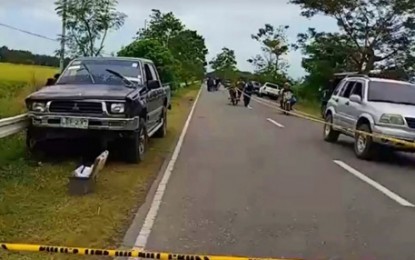 <p><strong>AMBUSH-SLAY.</strong> Police officers seal off the black Mitsubishi pickup vehicle of former Sultan Kudarat Vice Governor Rolando Recinto following his ambush by still unidentified gunmen on Tuesday afternoon (Jan. 7, 2020) along the highway in Barangay Bilumin, Lambayong, Sultan Kudarat. Probers say the victim was on his way home to Lambayong from nearby Tacurong City around 2 p.m. when fired upon by motorcycle-riding assassins.<em> (Photo courtesy of Lambayong MPS)</em></p>