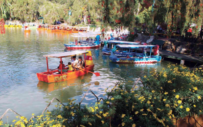 <p>Tourists enjoying the serene waters of the lake in Burnham Park in Baguio City. <em>(Photo courtesy of DOT)</em></p>