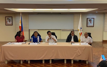 <p><strong>READY TO ASSIST.</strong> Labor officials, led by DOLE Secretary Silvestre Bello III, hold a press briefing on measures to assist OFWs who might be affected by the continuing tensions in the Middle East on Wednesday (Jan. 8, 2020). Aside from assisting OFWs, the Philippine Overseas Employment Administration said it is set to implement a deployment ban to Iran, Iraq and Lebanon.<em> (PNA photo by Ferdinand Patinio)</em></p>