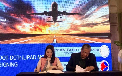 <p><strong>CONVERGENCE</strong>. Tourism Secretary Bernadette Romulo-Puyat and Transportation Secretary Arthur Tugade ink a pact on the Institutionalized Leveraging of Infrastructure Program for Airport Development (iLiPAD) at Clark Freeport, Pampanga on Wednesday (Jan. 8, 2020). The move aims to synchronize efforts to boost airport and route development program. <em>(Photo by Marna Dagumboy-del Rosario)</em></p>