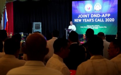 <p><strong>NEW YEAR'S CALL.</strong> Defense Secretary Delfin Lorenzana delivers his speech at the DND-AFP New Year's Call in Camp Aguinaldo on Wednesday (Jan. 8, 2020). Lorenzana urged all officials and employees of the DND and its attached bureaus to raise their standards of professionalism and foster an environment that will further the "One Defense Team" concept. <em>(Photo courtesy of DND Public Affairs Service)</em></p>