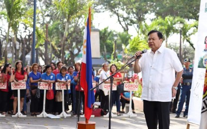 <p><strong>APPEAL FOR PRAYERS</strong>. Iloilo City Mayor Jerry P. Treñas appeals for prayers for those who are affected by the Taal Volcano eruption during the flag-raising ceremony at the city's Plaza Libertad on Monday (Jan. 13, 2020). The Philippine Institute of Volcanology and Seismology earlier raised the danger level around Taal three notches to level 4, indicating “an imminent hazardous eruption. <em>(Photo courtesy of City Mayor's Office)</em></p>