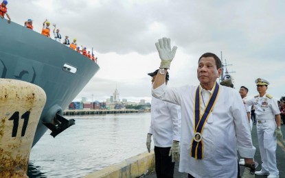 <p><strong>SEND-OFF</strong>. President Rodrigo Roa Duterte waves at the personnel BRP Davao del Sur and BRP Ramon Alcaraz as he leads the send-off ceremony of the two Philippine Navy (PN) ships at the Port Area in Manila on January 14, 2020. The PN ships are part of the Joint Task Force "Pagpauli" which will sail to the Middle East for the repatriation of OFWs. (<em>Presidential photo by King Rodriguez)</em></p>