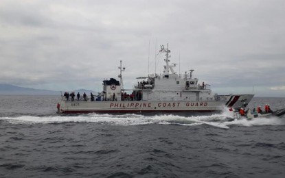 <p><strong>SEA-RESCUE. </strong>The Philippine Coast Guard's (PCG) BRP Tubbataha with a deployed rigid-hull inflatable boat during the search and rescue and fire-at-sea scenario exercise off the coast of Manila on Wednesday (Jan. 15, 2019). The exercise is part of a five-day port call of the CCG in the country -- the first-ever maritime exercise held between the two countries in the Philippines. (<em>Photo courtesy of PCG</em>) </p>