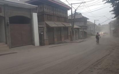 <p><strong>BEYOND THE ASHES.</strong> Ash spewed by Taal Volcano's eruption blanket the main road of Taal town in Batangas on Monday (Jan. 13, 2020). Classified as a third-class municipality, the town is a home of many past and present-day heroes of the country. <em>(PNA photo by Benjamin Pulta)</em></p>